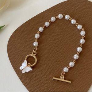 Butterfly pearl bracelet